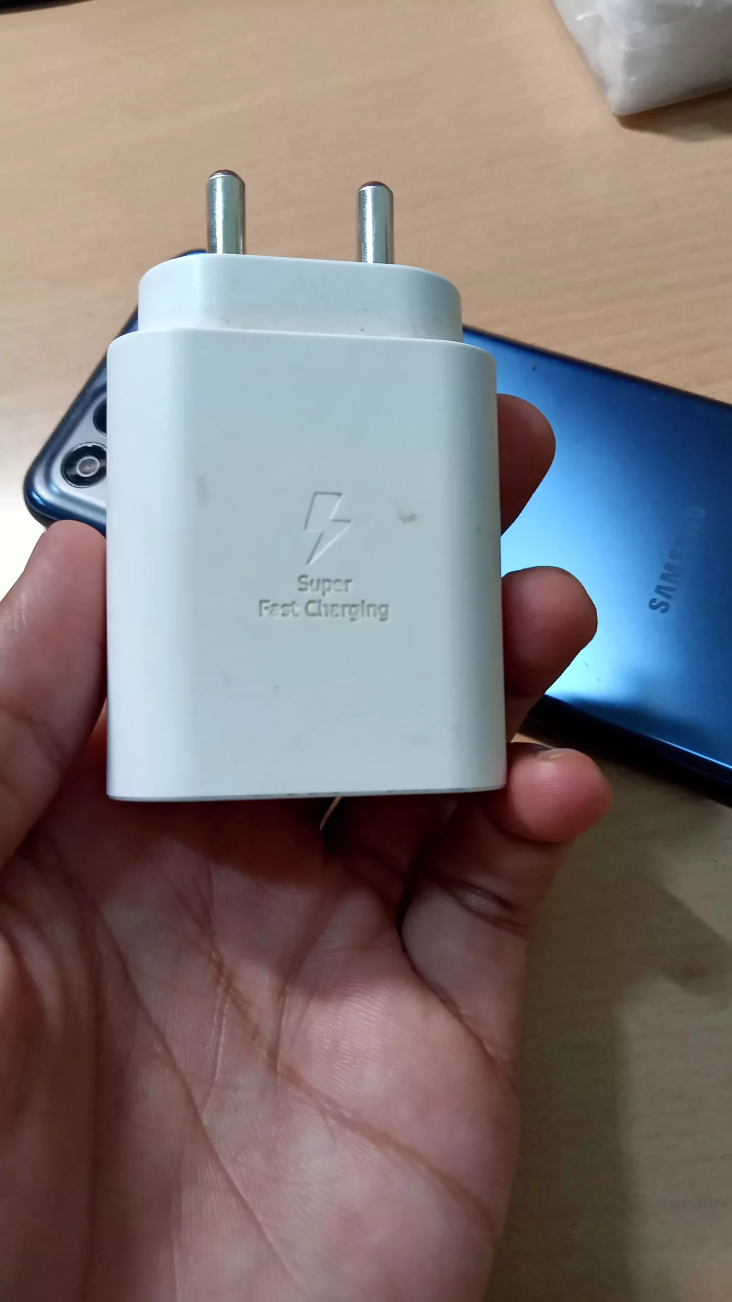 samsung 25W fast charger in hands